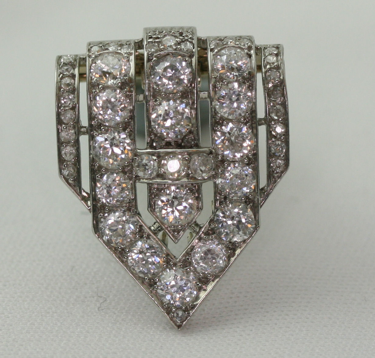 An Art Deco French white gold mounted diamond set clip