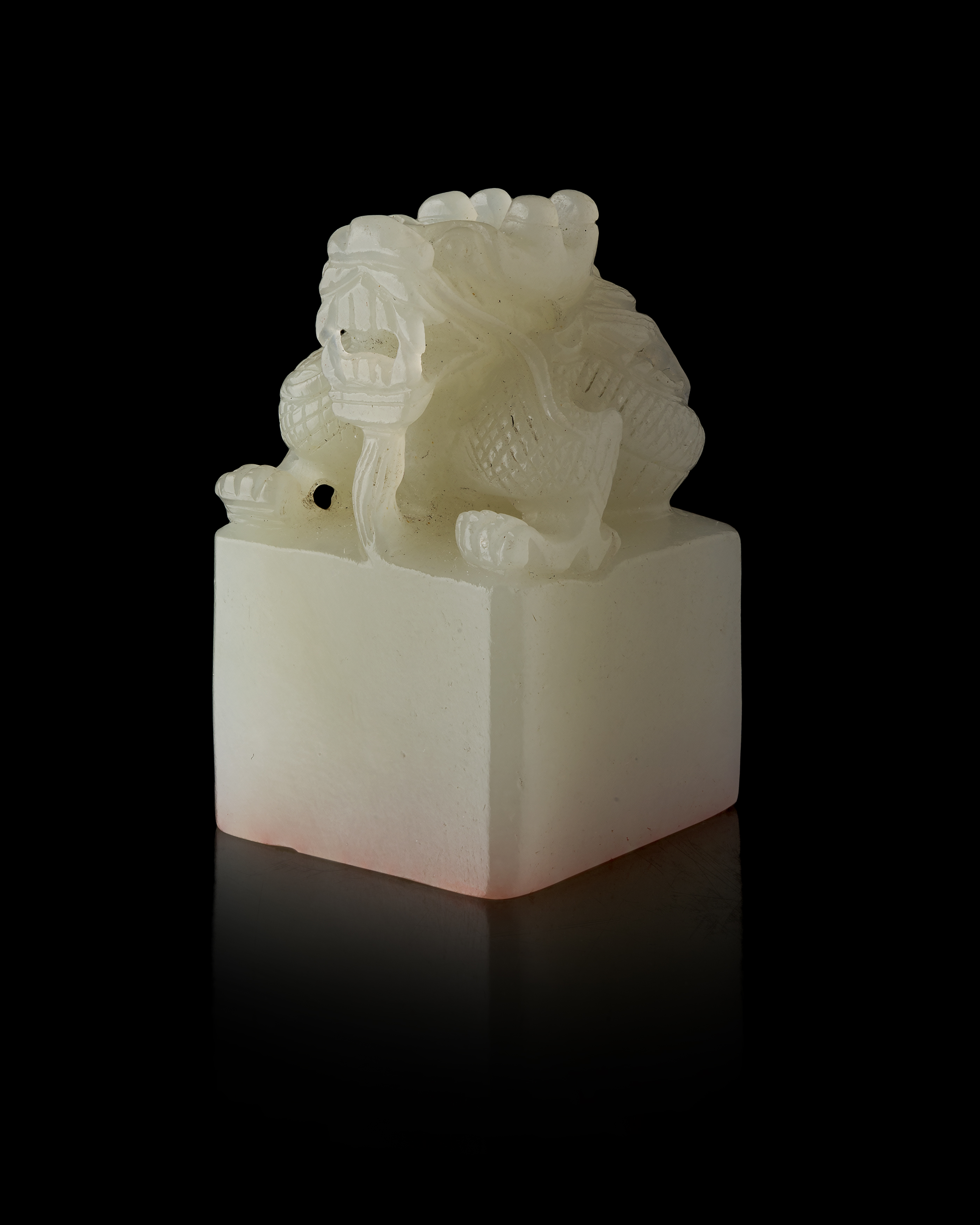 GREENISH-WHITE JADE CARVED 'DRAGON' SEAL