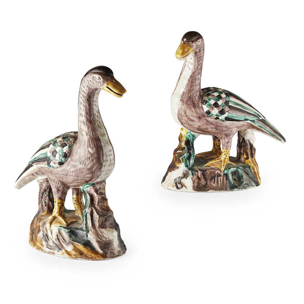 PAIR OF FAMILLE VERTE BISCUIT-GLAZED DUCKS