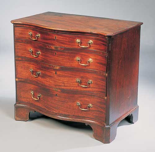 A George III mahogany serpentine chest of drawers