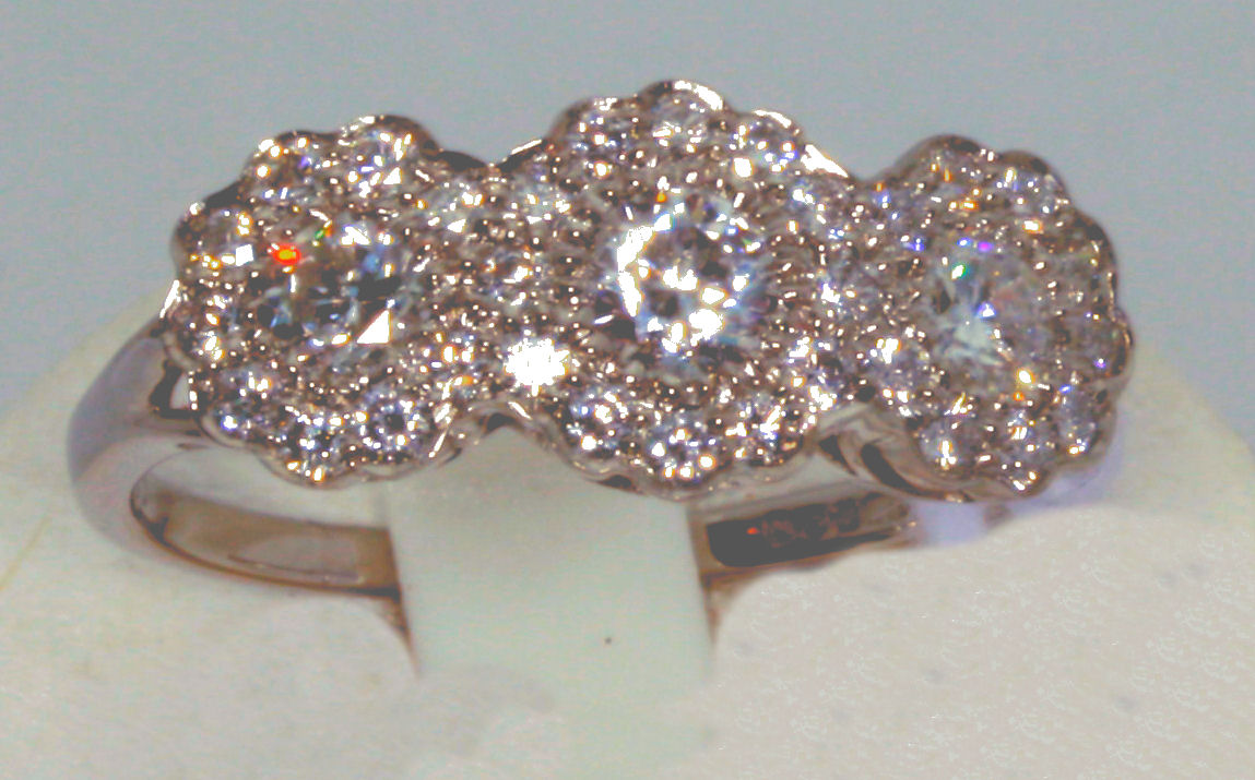 A platinum mounted Belle Epoque style diamond cluster ring,