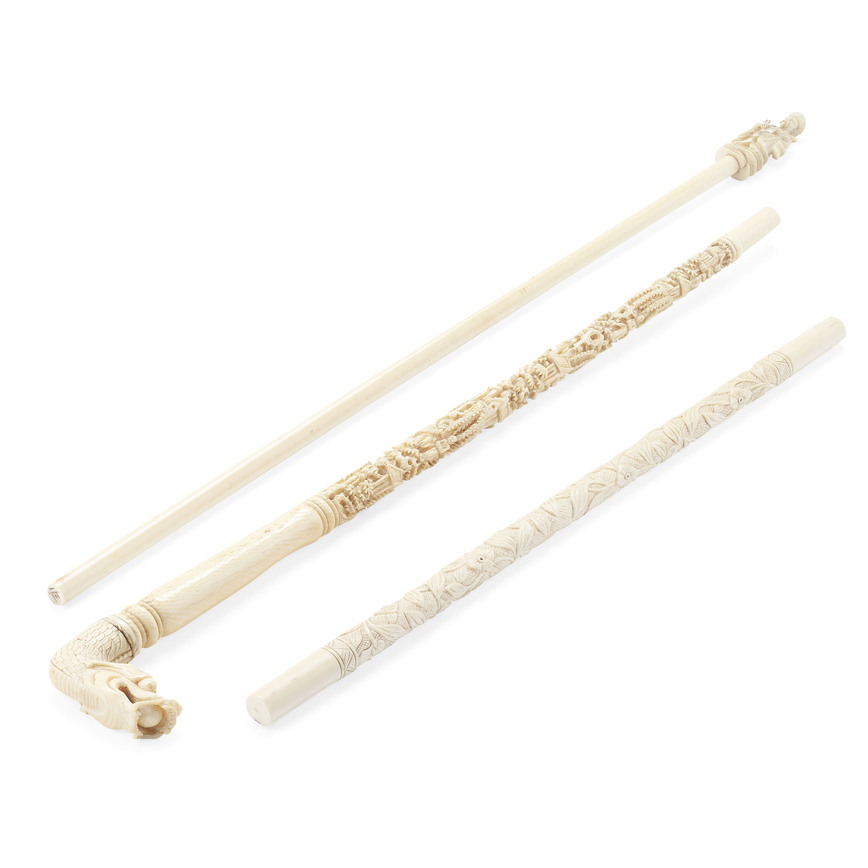THREE CHINESE CARVED IVORY STICKS