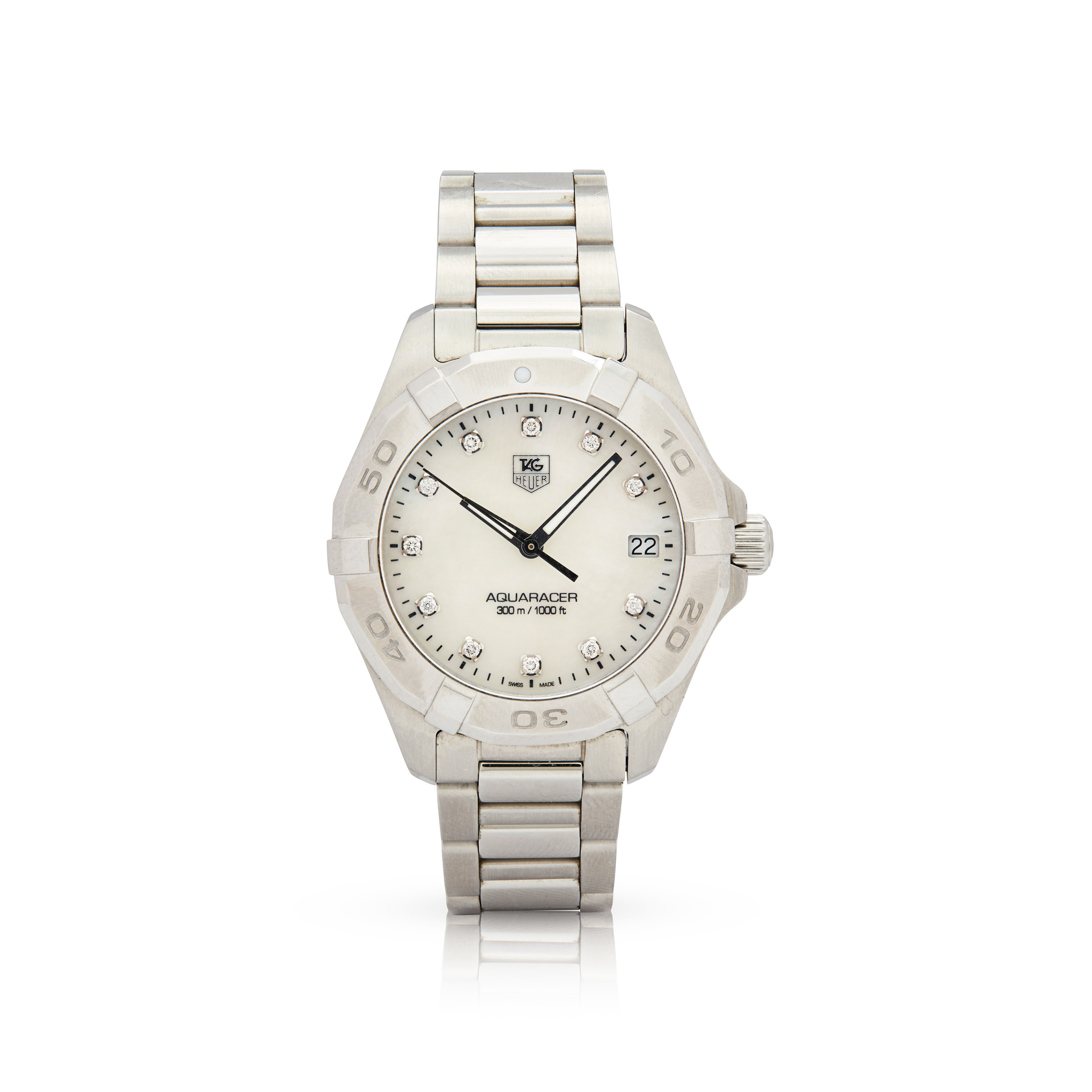 Tag Heuer. A Ladies stainless steel quartz wristwatch with mother-of-pearl dial and date