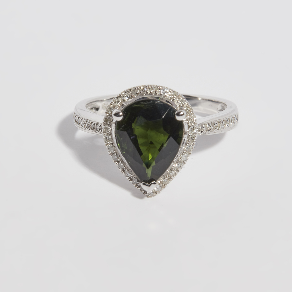 A tourmaline and diamond set ring
