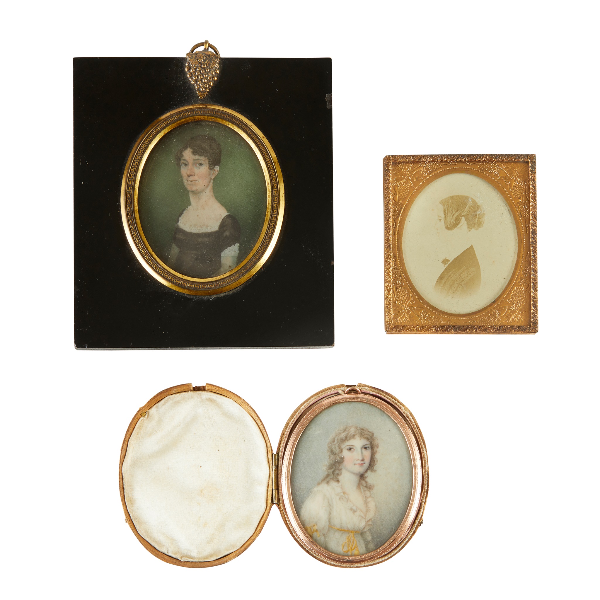 THREE PORTRAIT MINIATURES OF YOUNG LADIES