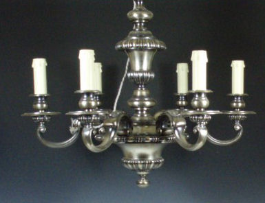 A 20th century metal six branch chandelier