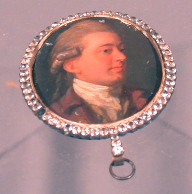 An oval miniature portrait of a gentleman,