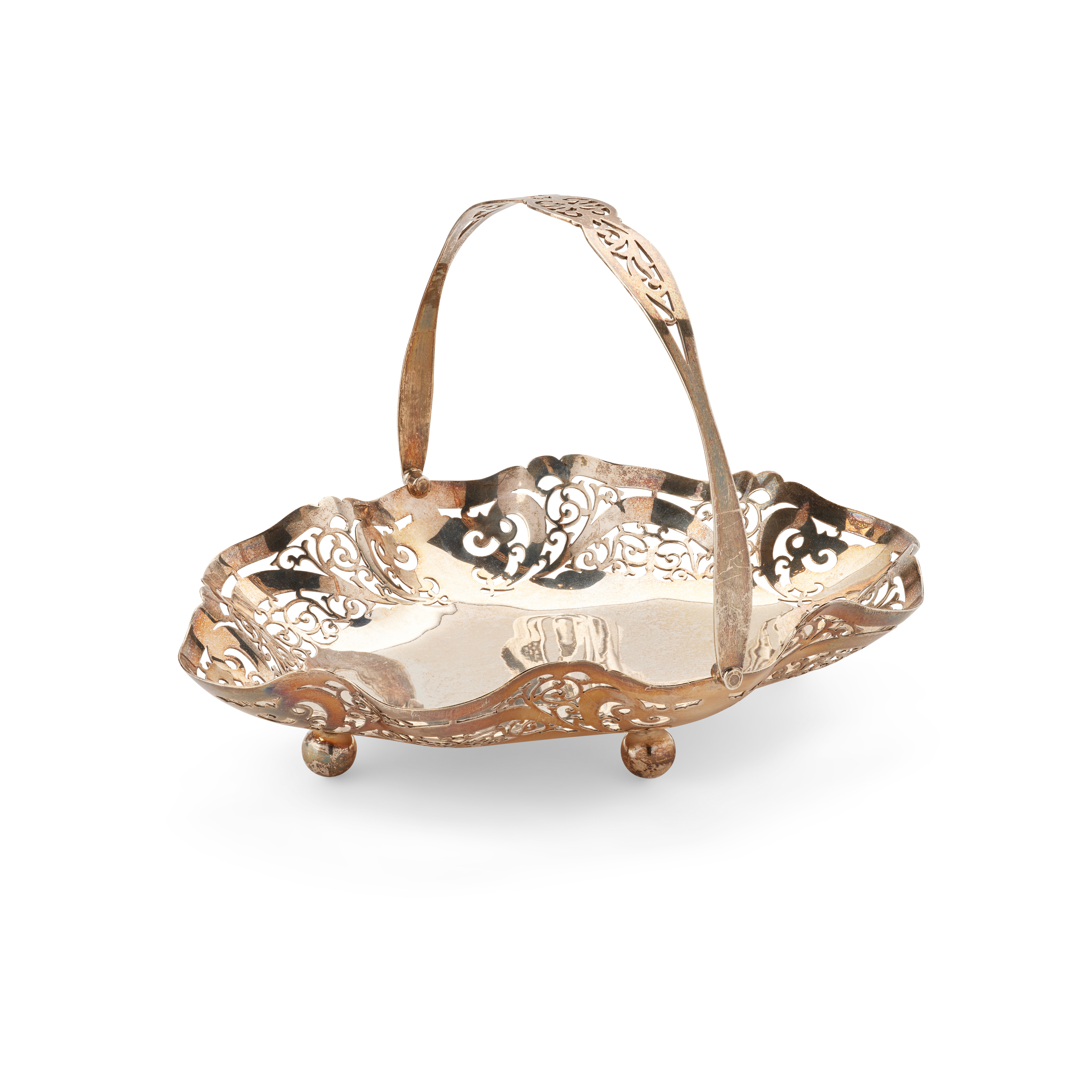 A 1930s SWING-HANDLED CAKE BASKET