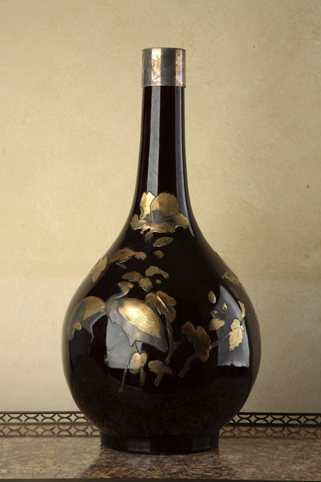A 19th century Japanese porcelain bottle vase