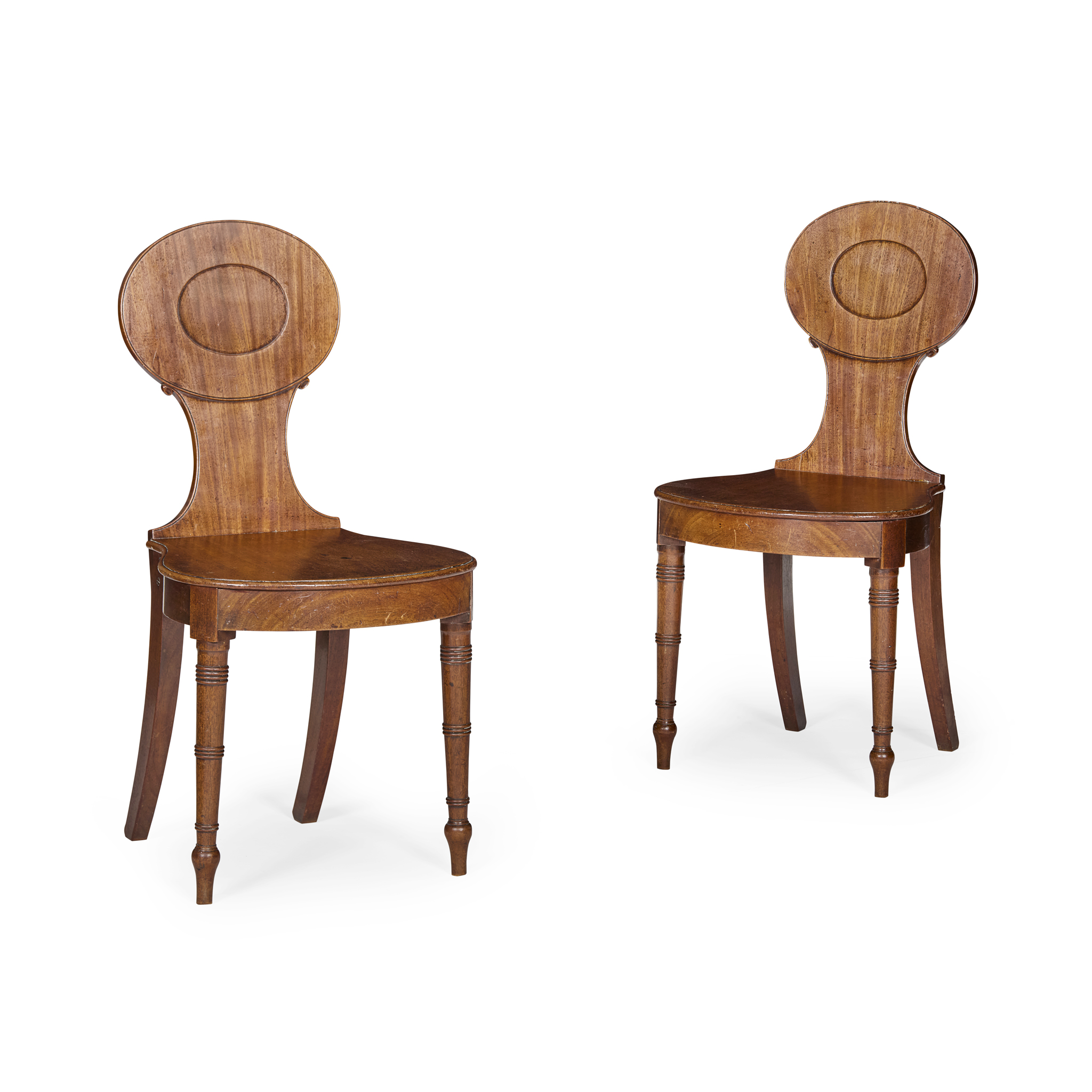 PAIR OF LATE GEORGE III MAHOGANY HALL CHAIRS