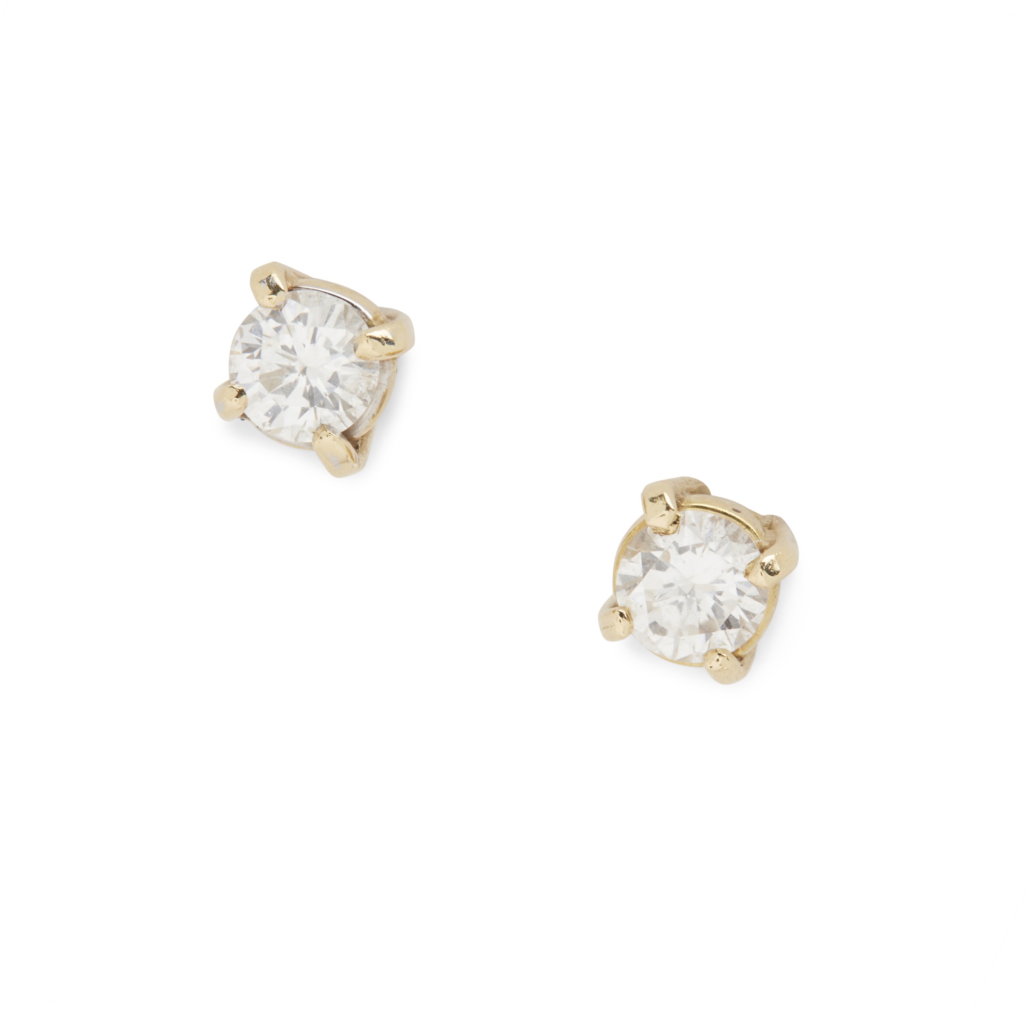 A pair of diamond stud earrings