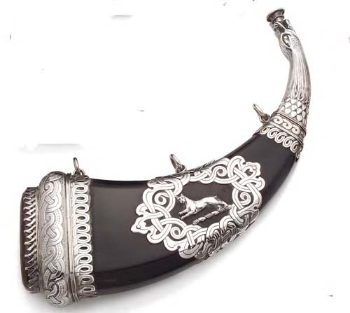 A large mounted dress powder horn,