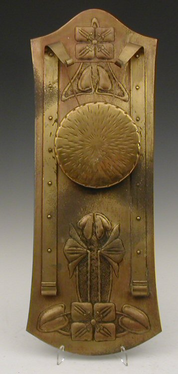 A Scottish Arts and Crafts brass wall mounted gong,
