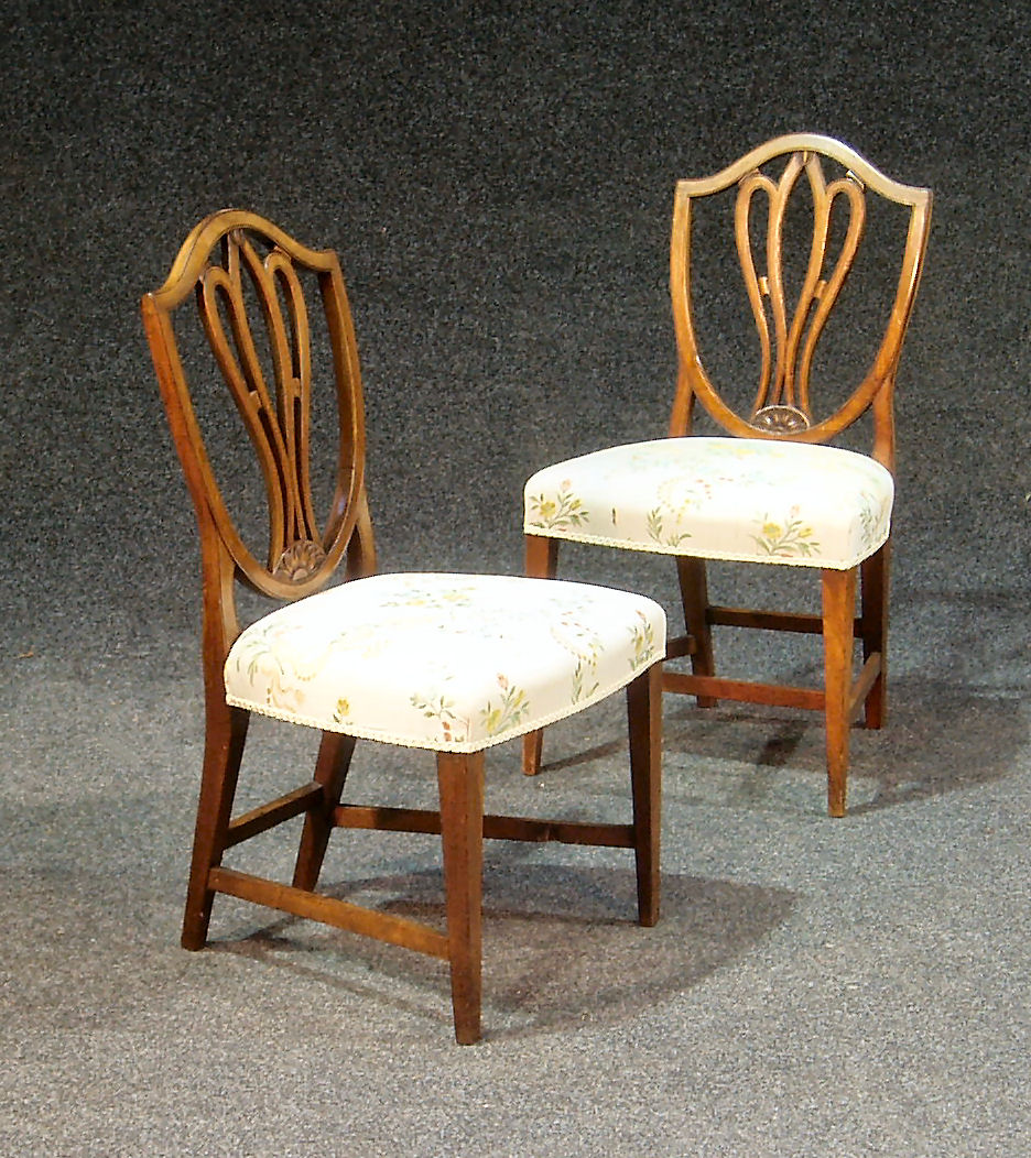 A set of three mahogany dining chairs,