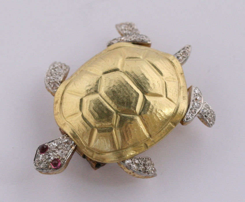 CARTIER - a ruby and diamond set turtle form brooch