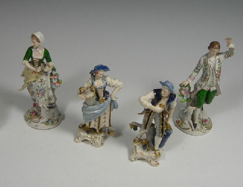 A pair of Sitzendorf porcelain figures