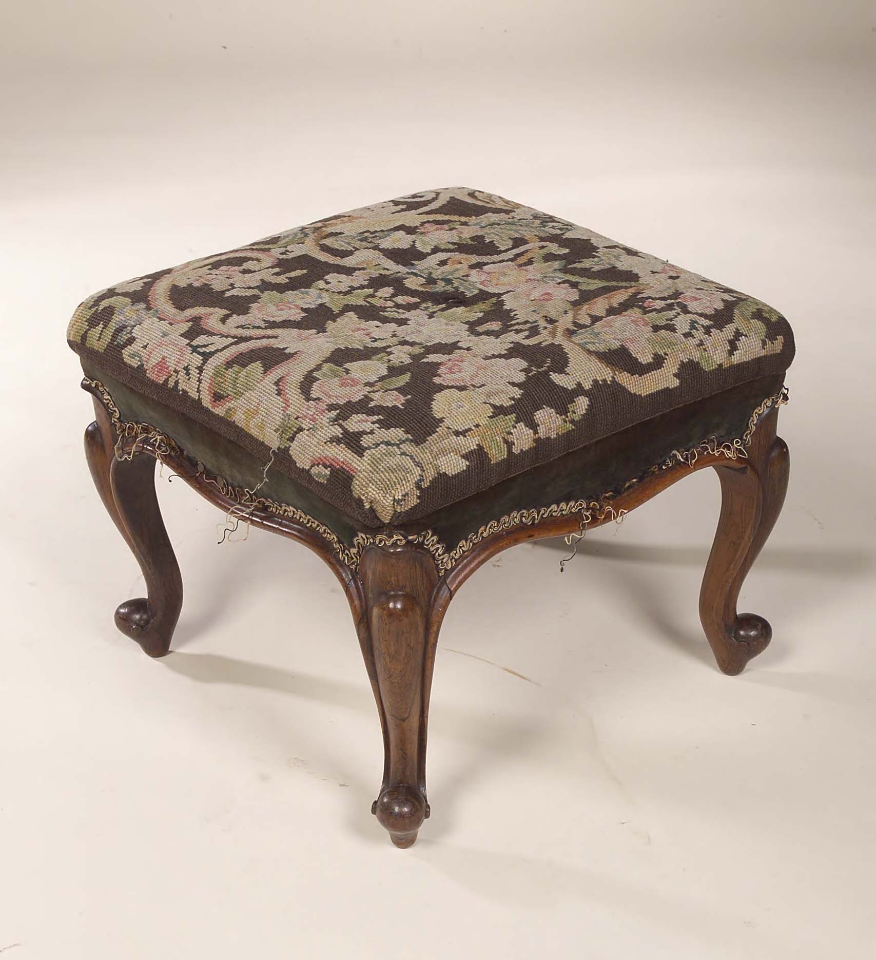 A Victorian rosewood footstool,