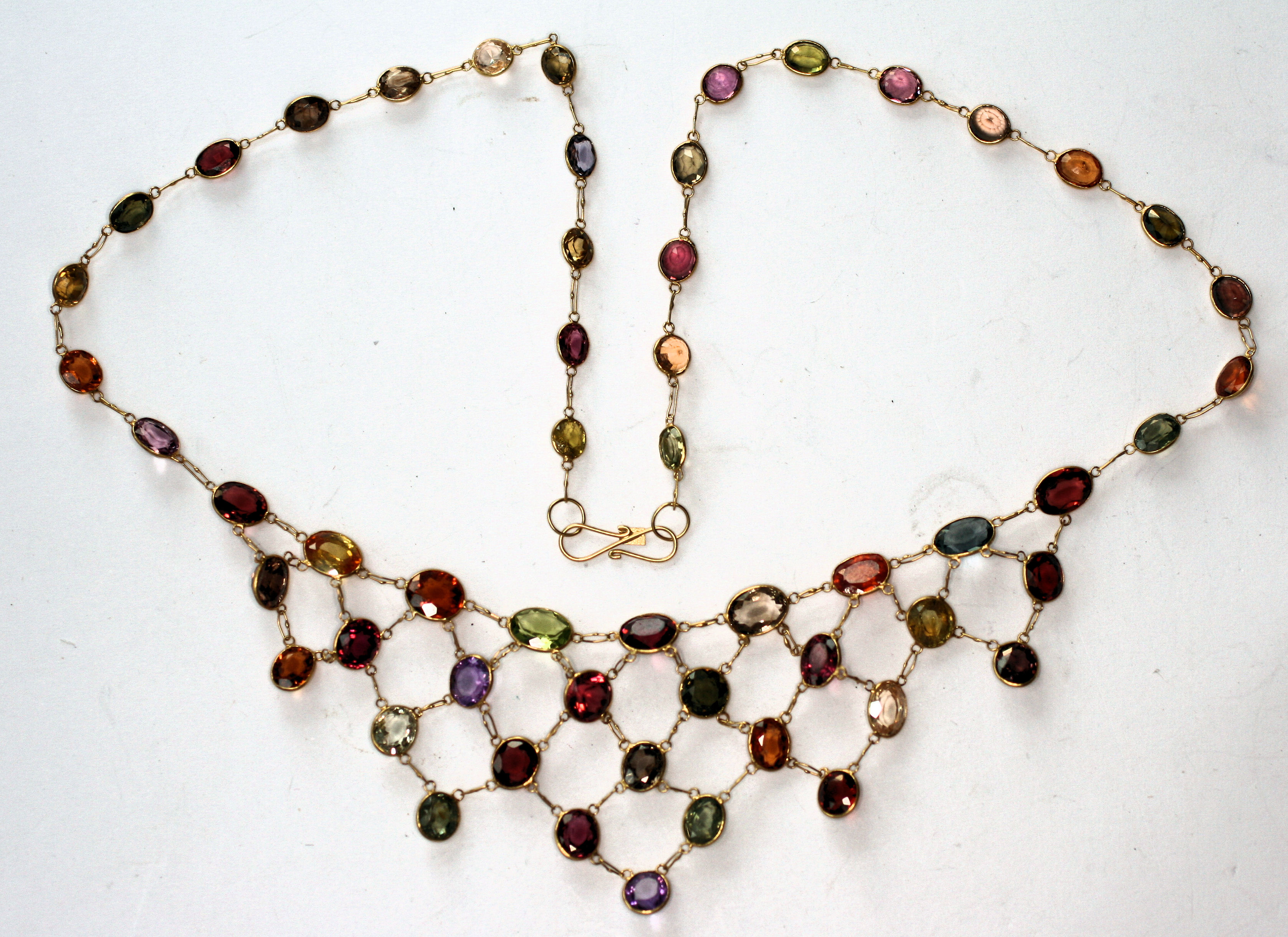A multi colour gem set fringe necklace