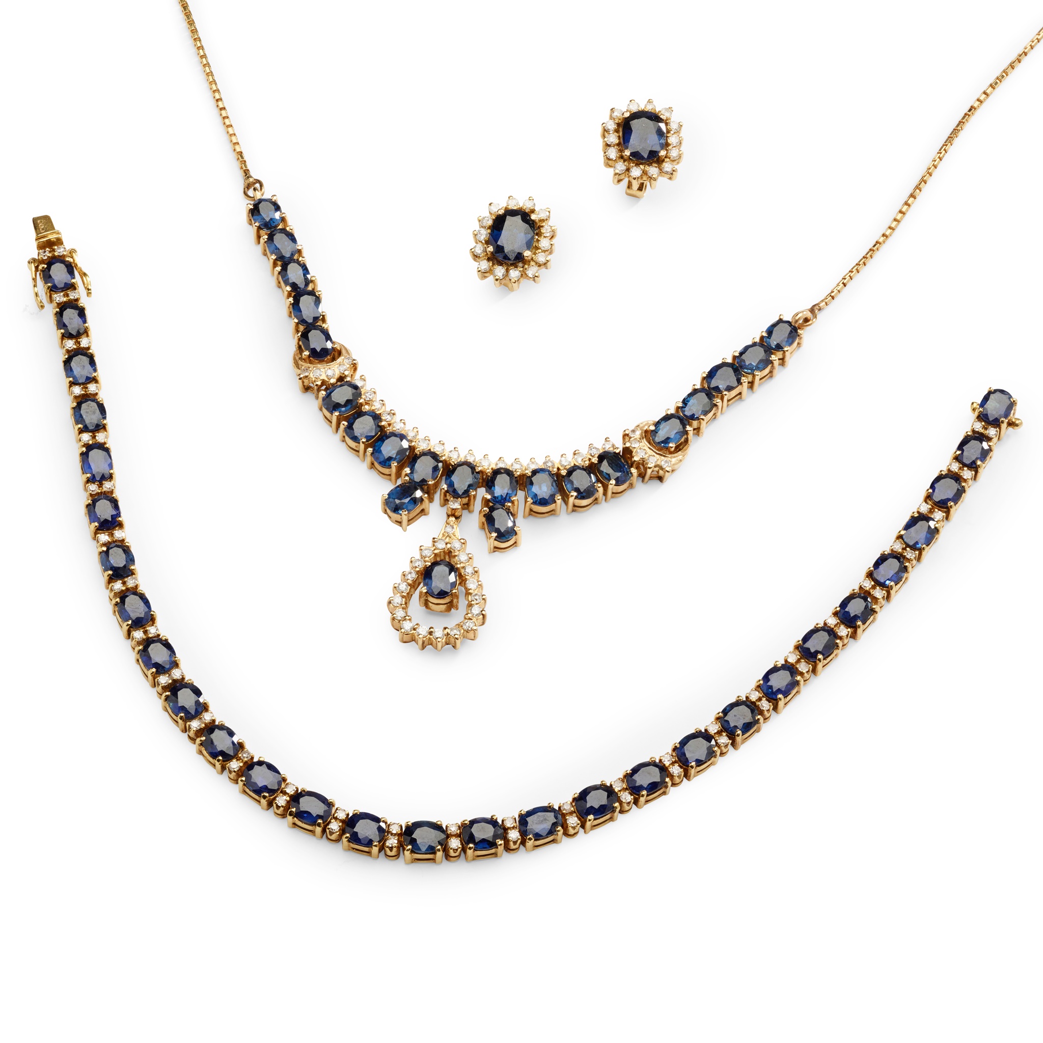 A matching sapphire and diamond necklace, bracelet and earrings