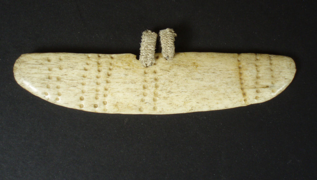 An ethnographic bone ornament Possibly a brow band from Thule or Inuit culture