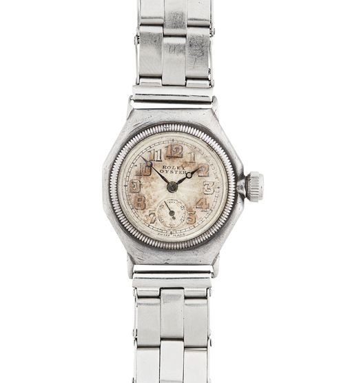 ROLEX - A lady's silver cased wrist watch
