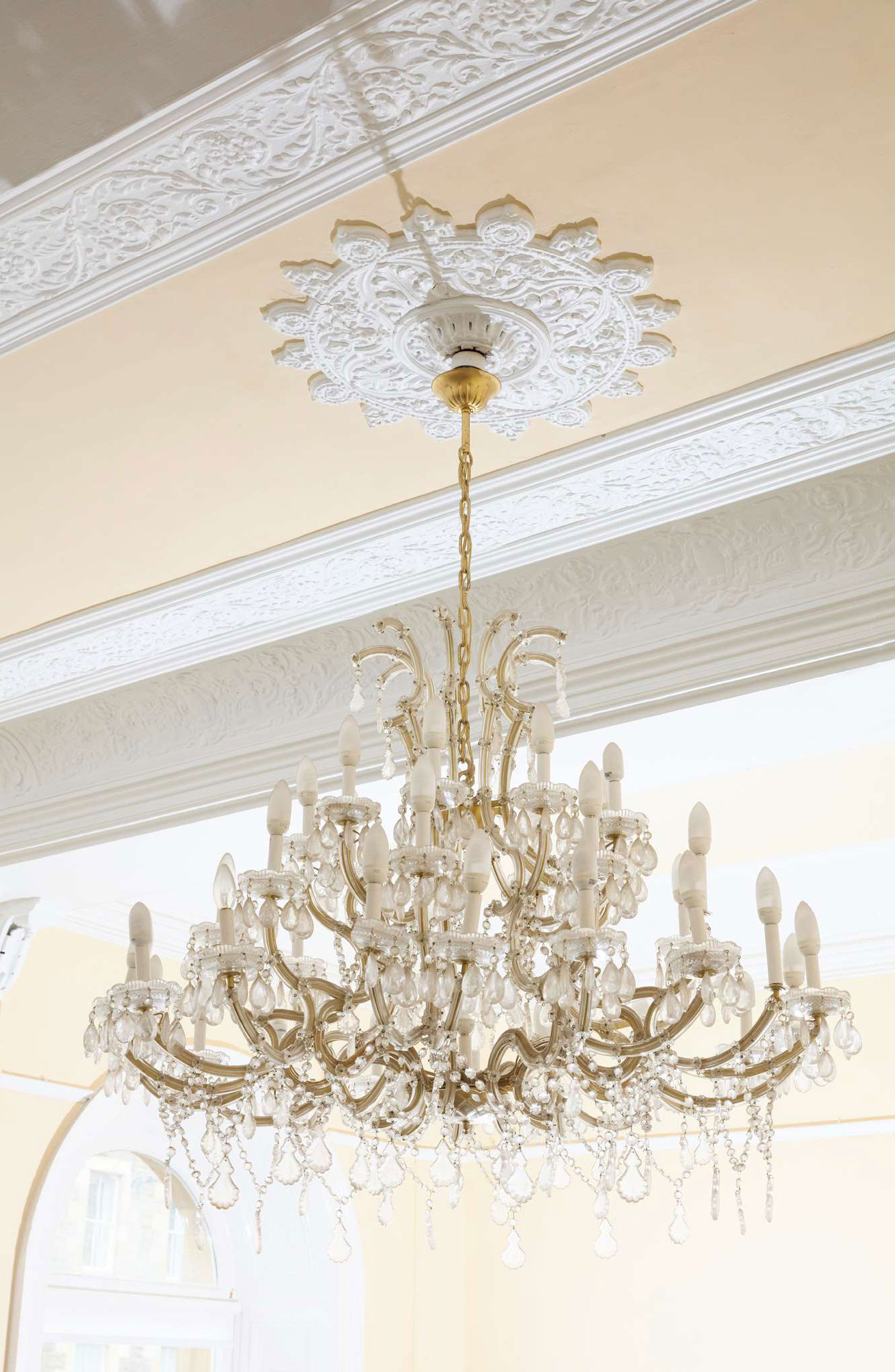PAIR OF ROCOCO STYLE THIRTY-SIX LIGHT CUT GLASS CHANDELIERS