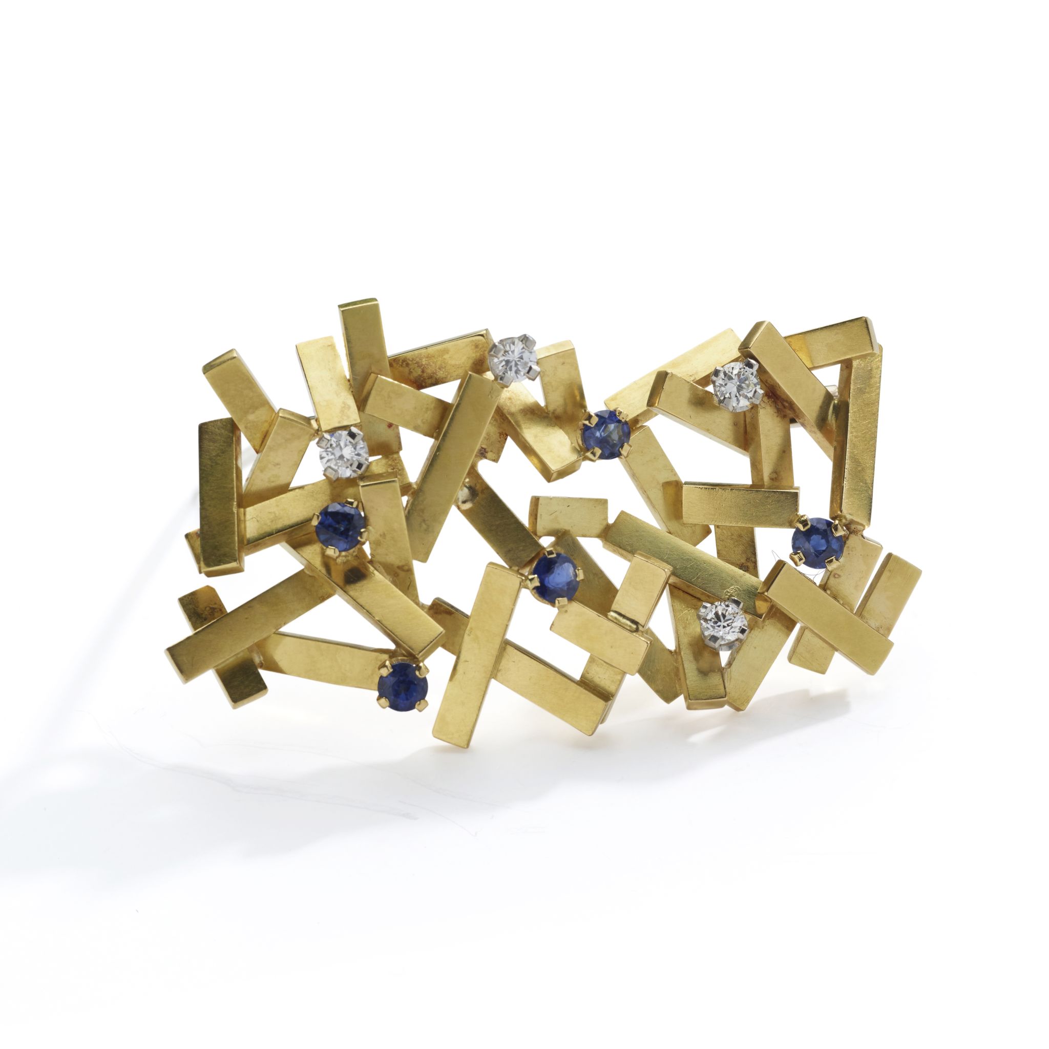 A sapphire and diamond-set pendant/brooch, by Andrew Grima, 1979