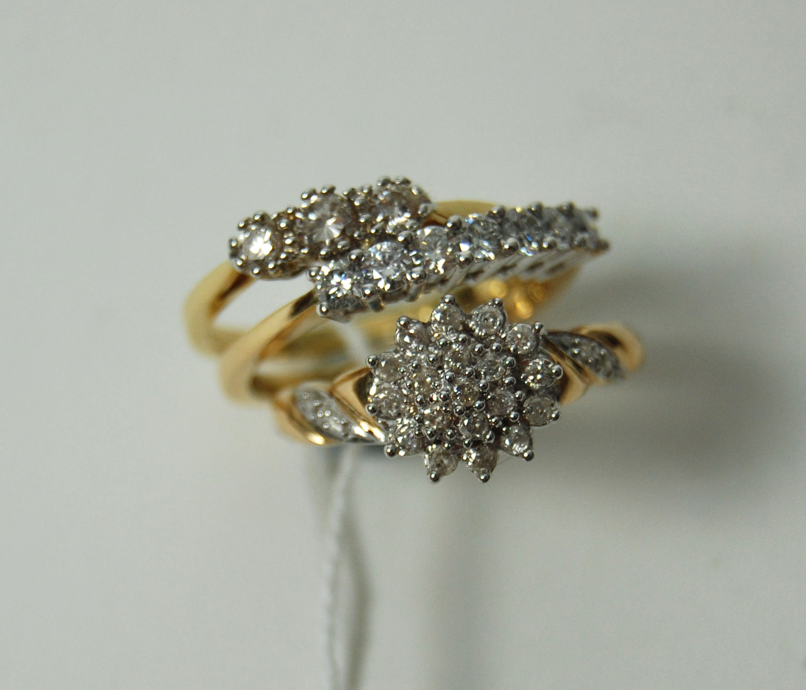 A 9ct gold mounted diamond floral cluster ring,