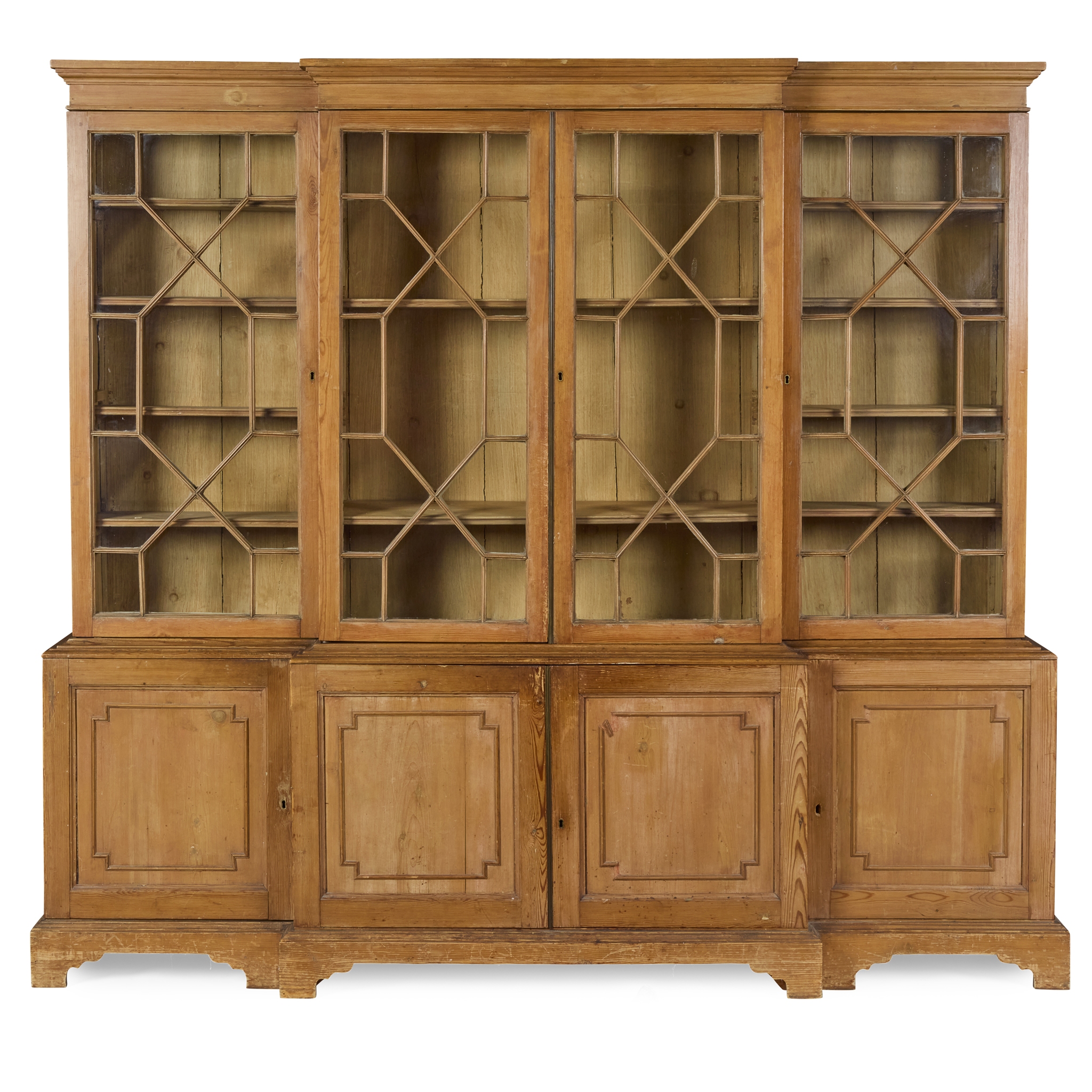 GEORGE III STRIPPED PINE BREAKFRONT BOOKCASE