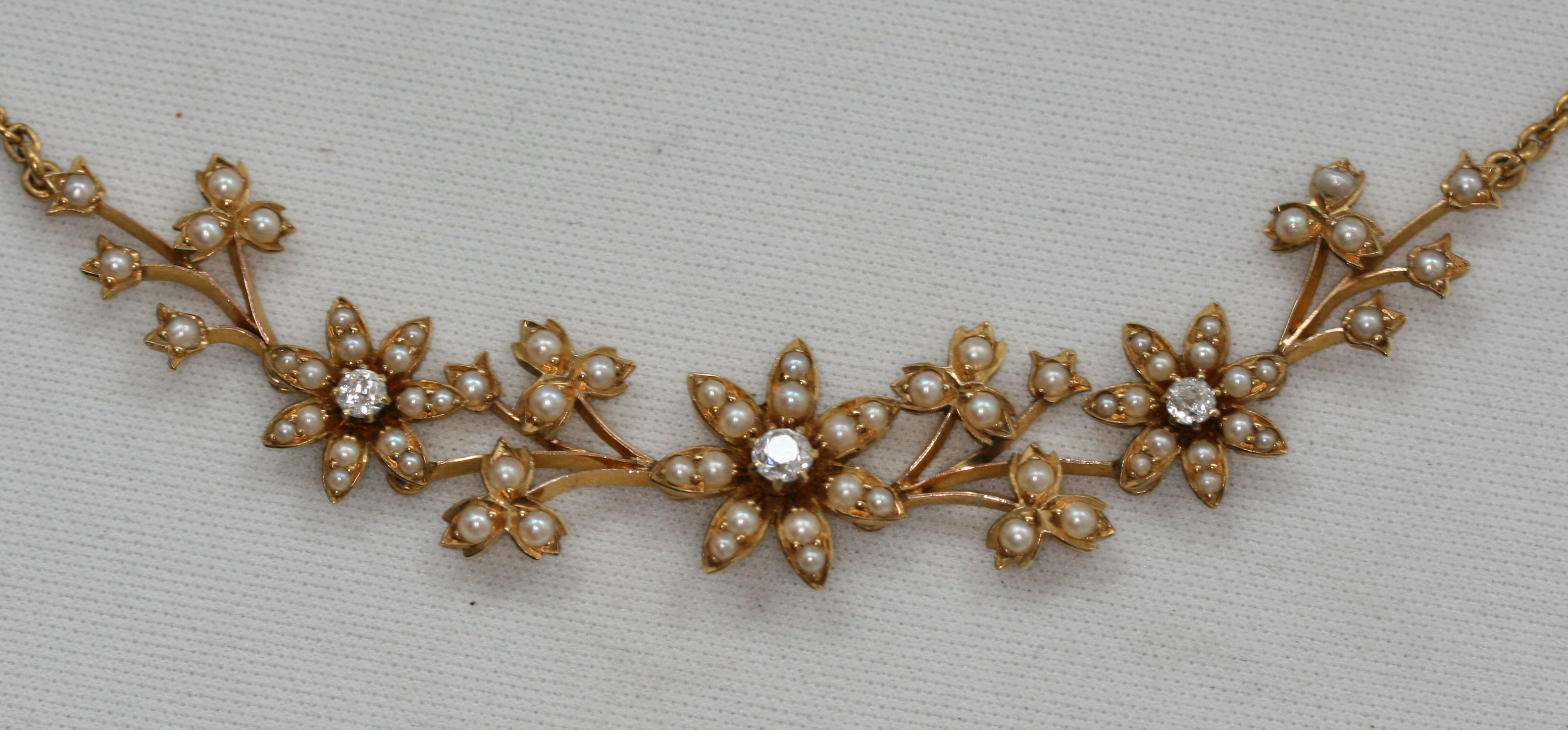 An Edwardian pearl and diamond necklace