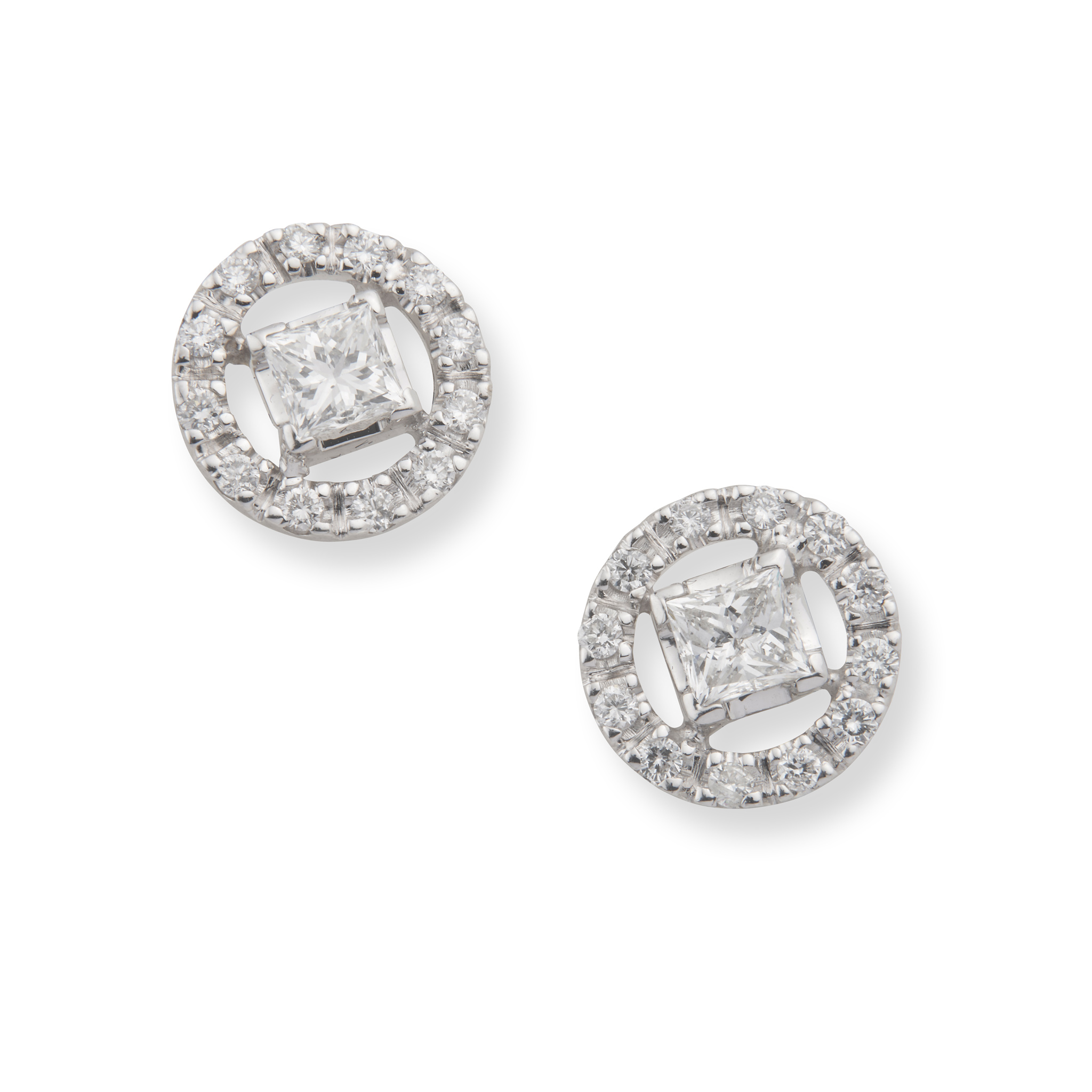 A pair of diamond halo earrings