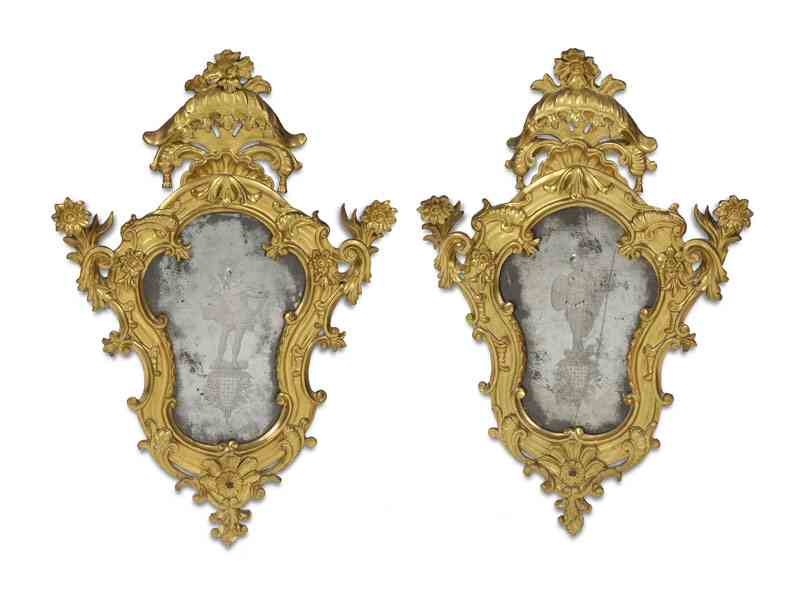 A pair of 19th century North Italian giltwood and gesso wall mirrors
