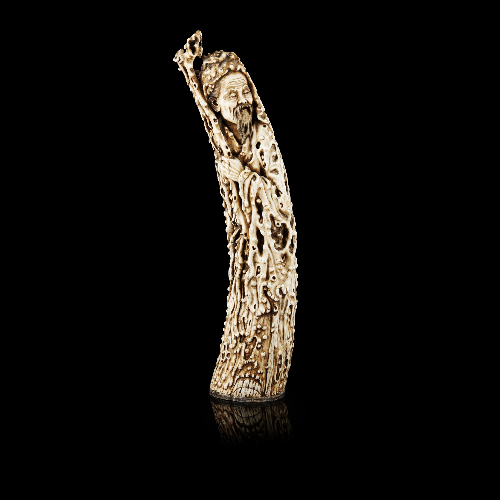 LARGE IVORY CARVING OF A MALE FIGURE