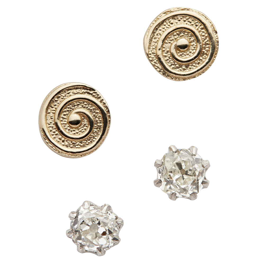 A pair of diamond set stud earrings