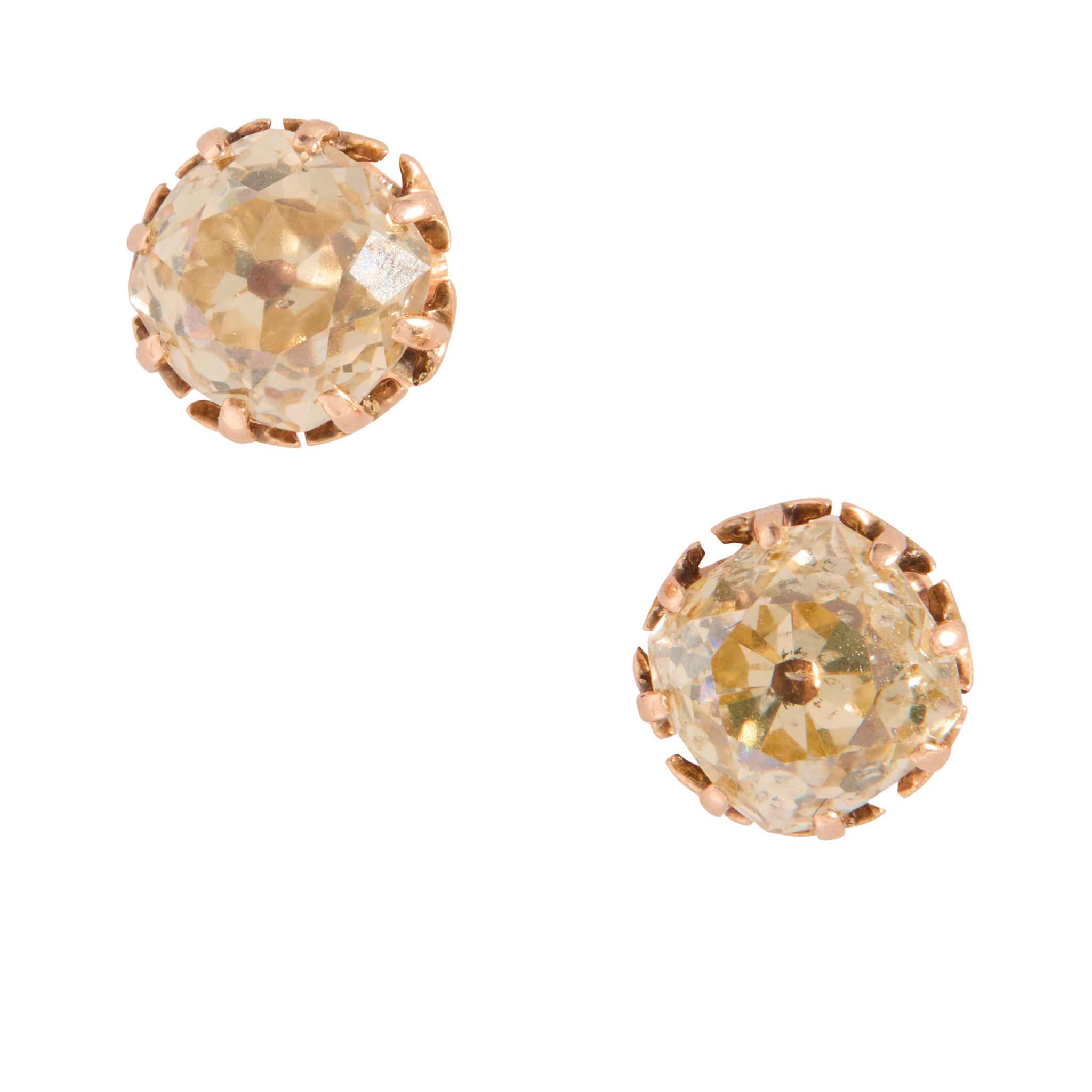 A pair of diamond stud earrings