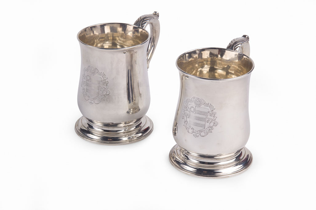 A pair of George II mugs