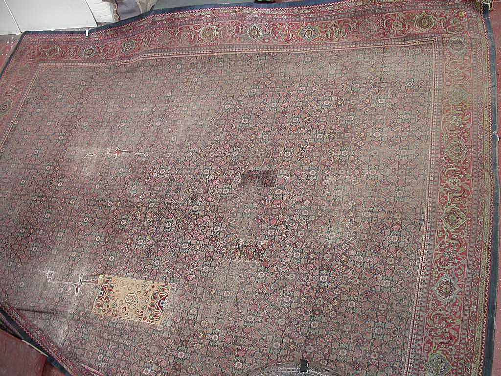 A large Feraghan carpet,
