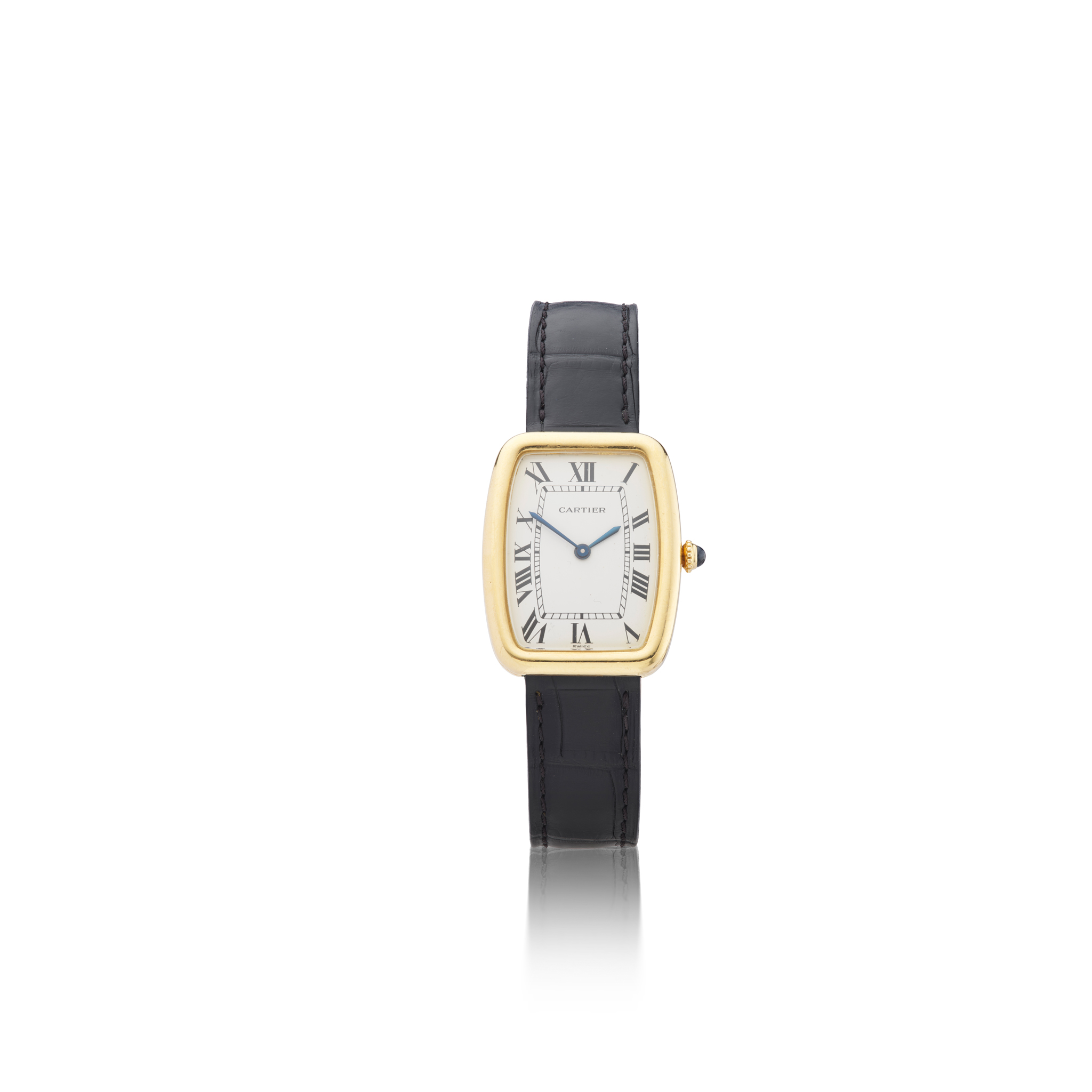 Cartier: A gold tonneau shape wristwatch