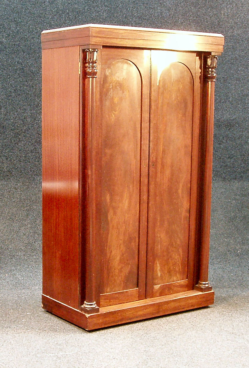 A William IV mahogany linen press,
