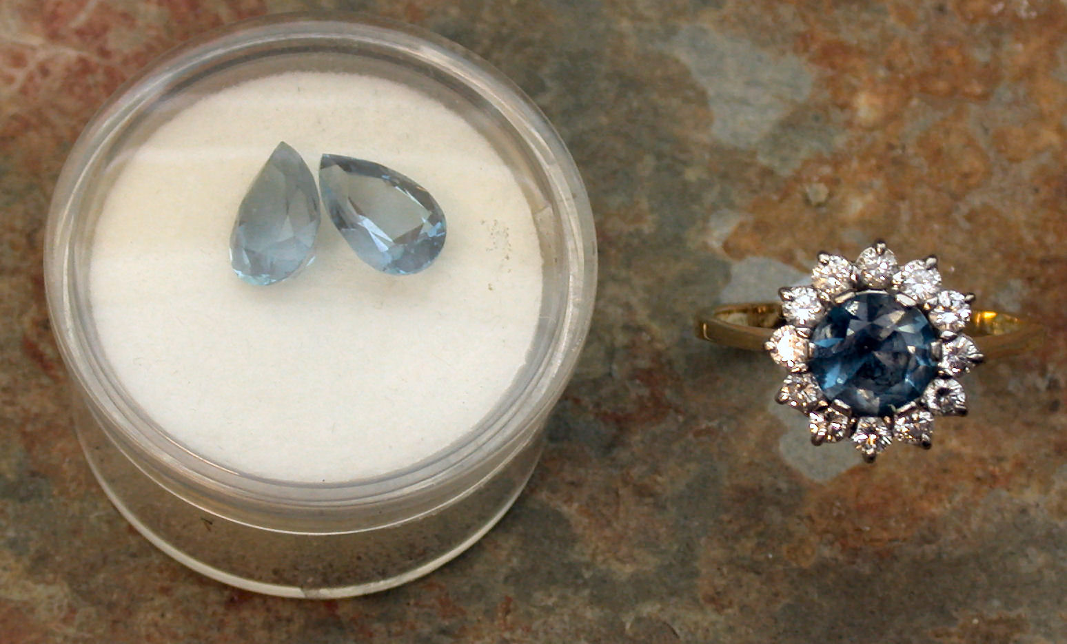 An 18ct gold mounted blue topaz and diamond ring,