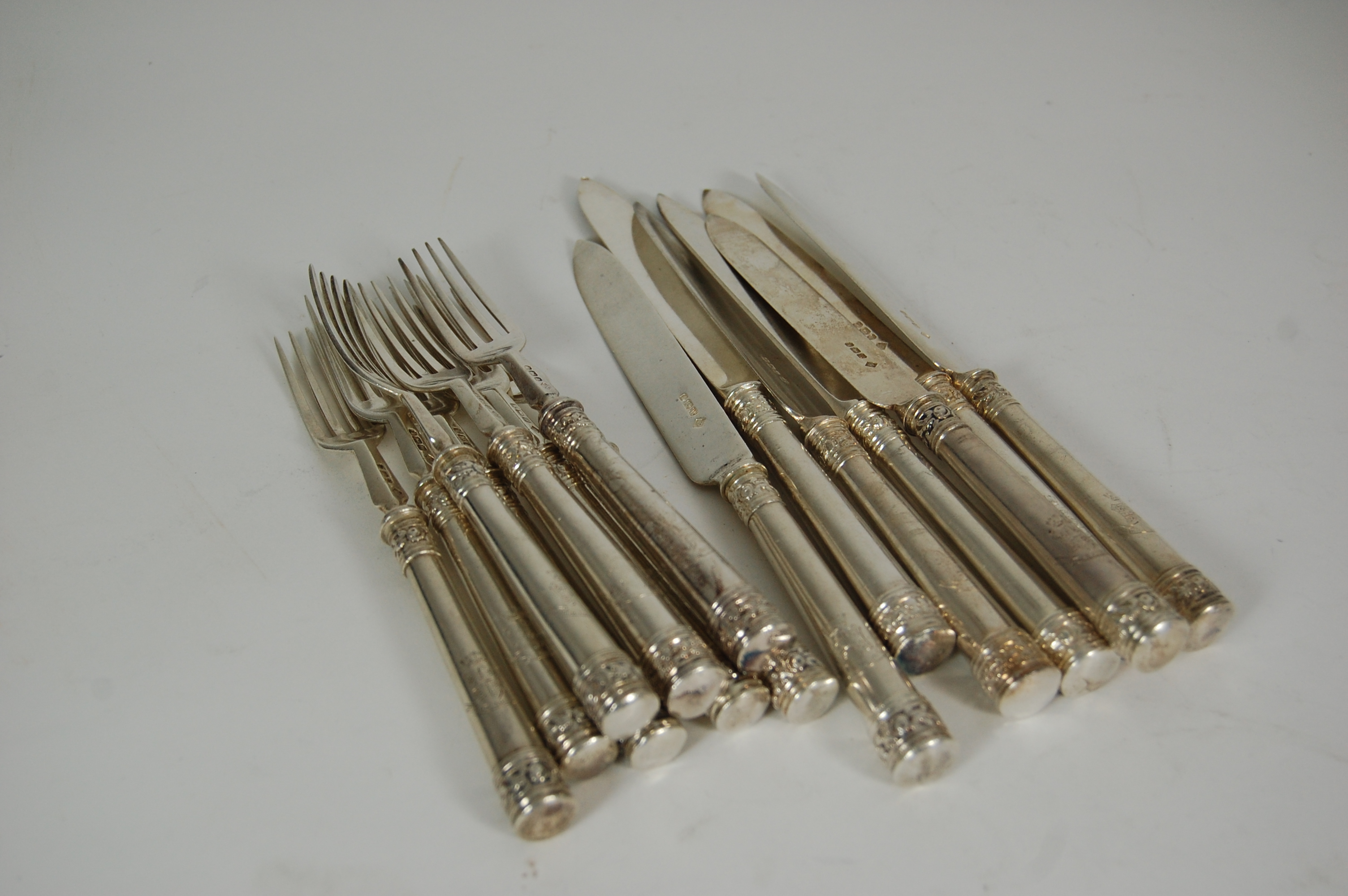 Naval interest - A matched set of twelve fruit knives and forks