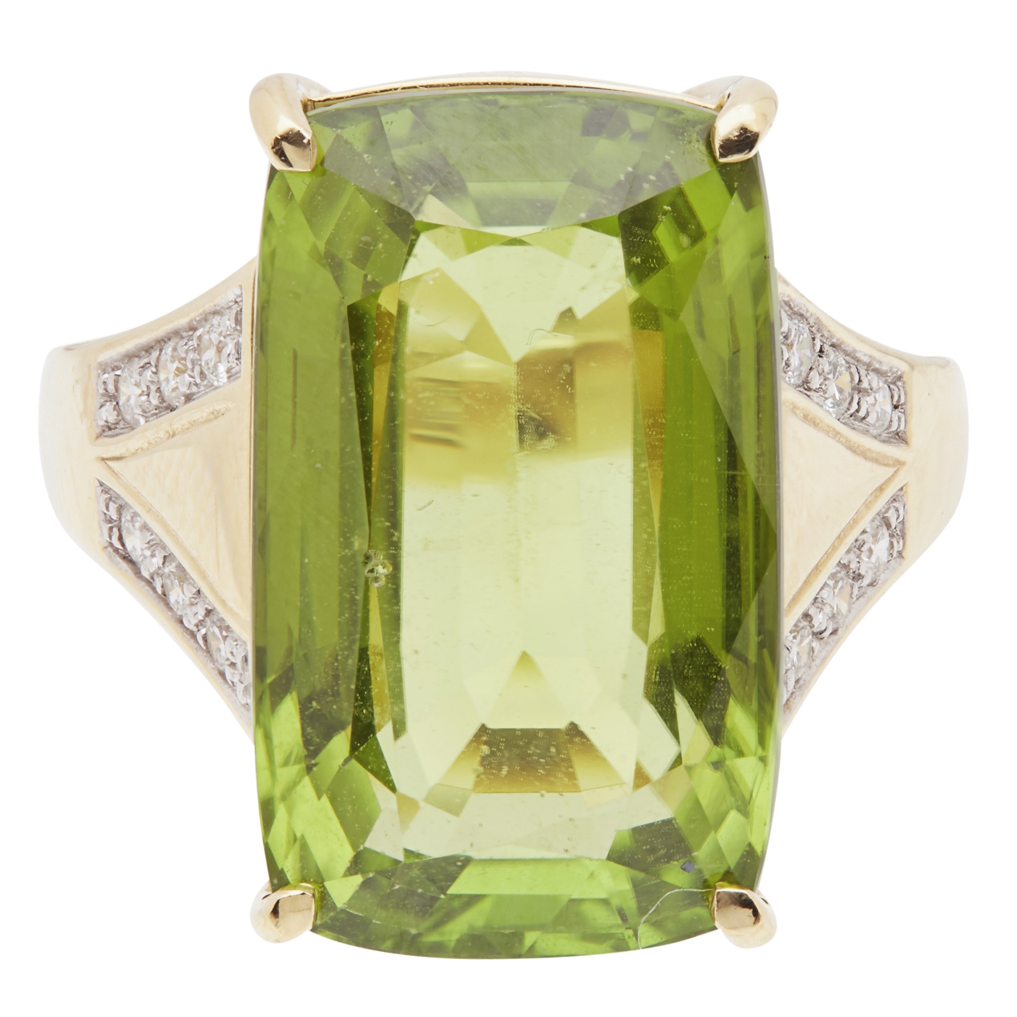 A peridot and diamond set cocktail ring