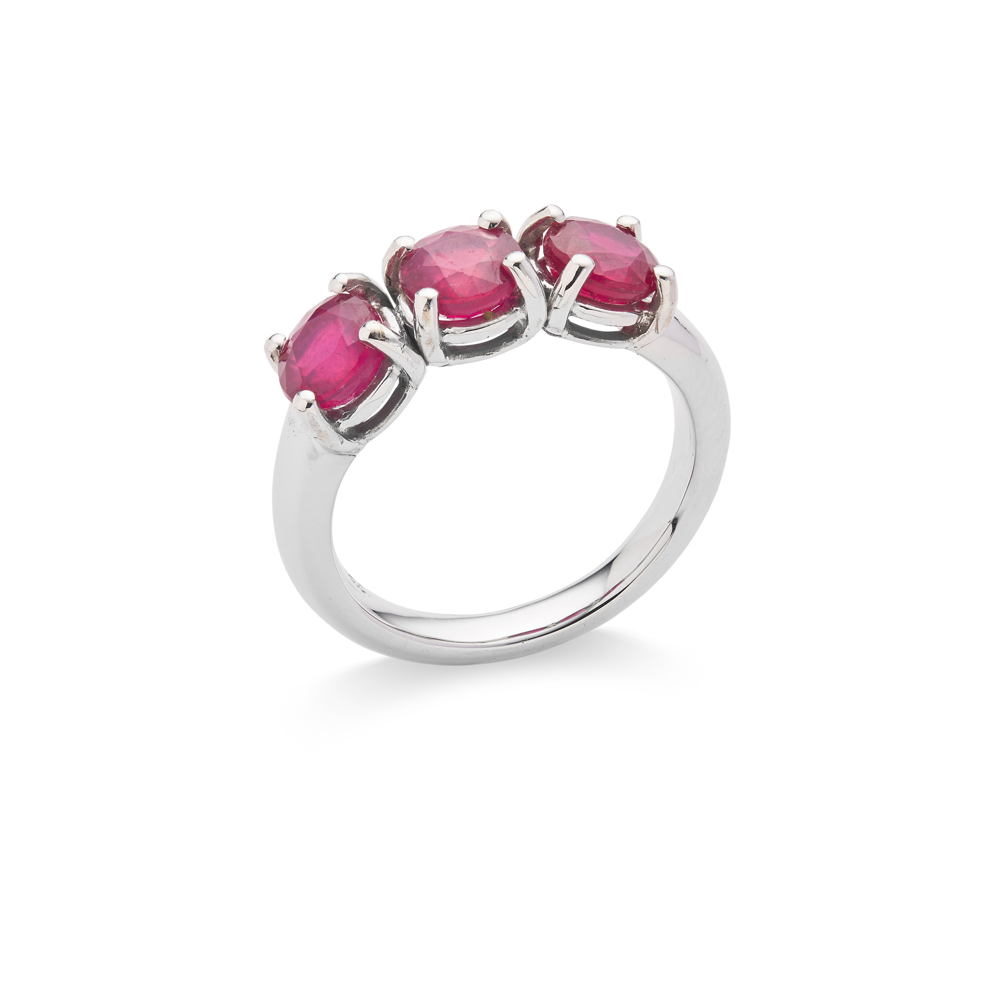 A ruby three-stone ring