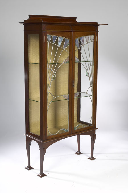 An Art Nouveau mahogany display cabinet
