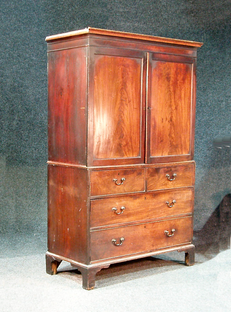 A George III mahogany linen press