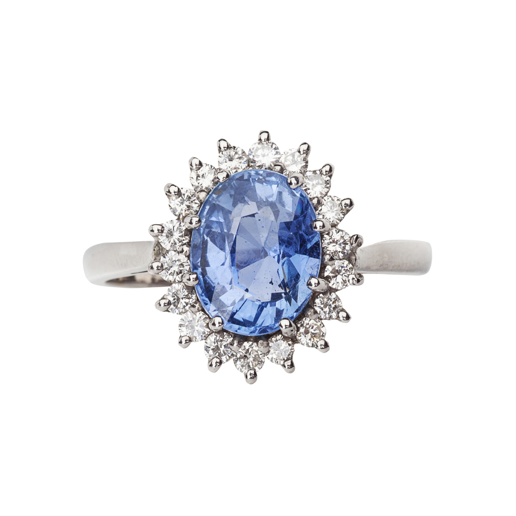 An 18ct white gold, sapphire and diamond cluster ring