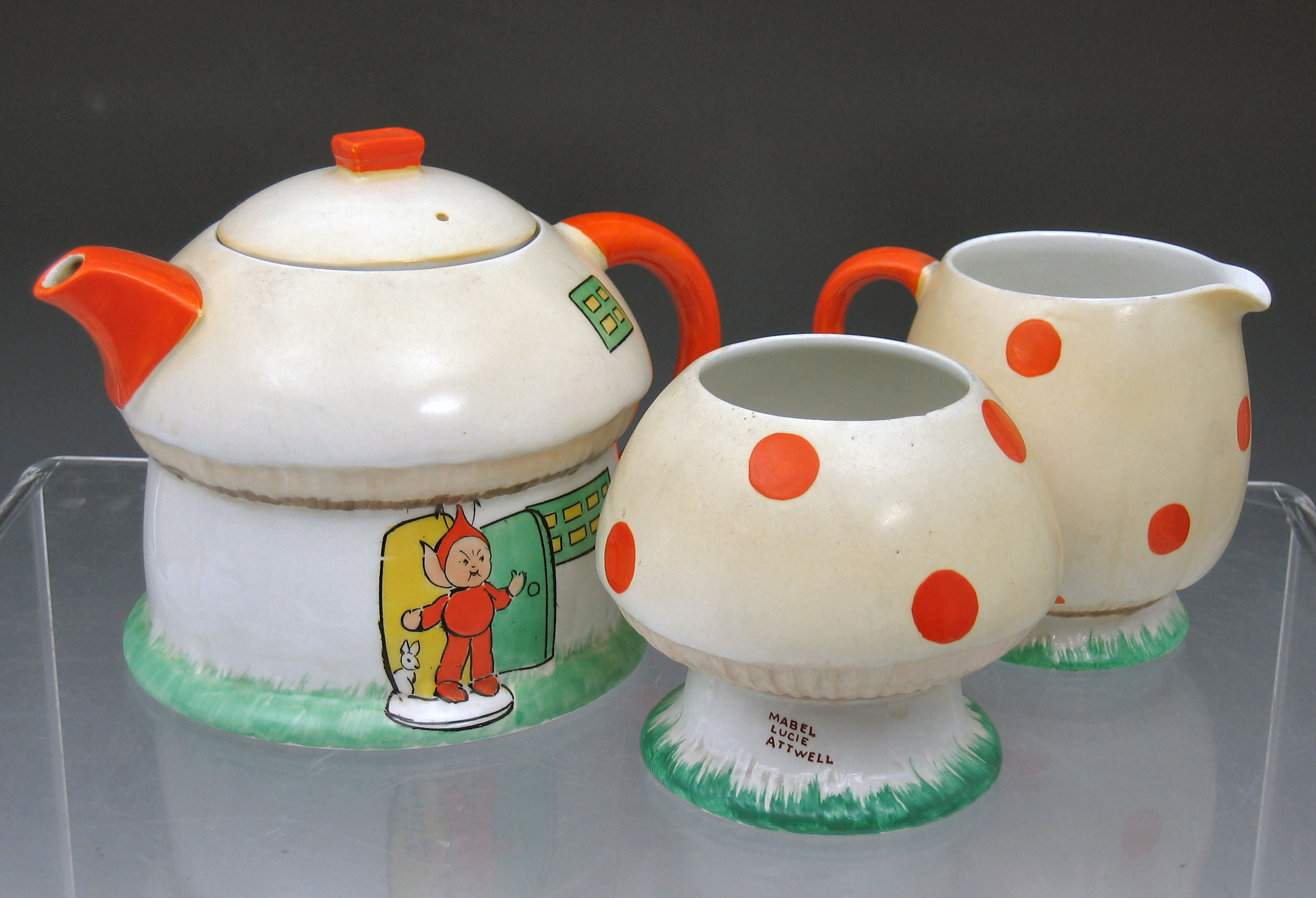 A Shelley three piece tea service, designed by Mabel Lucy Attwell,