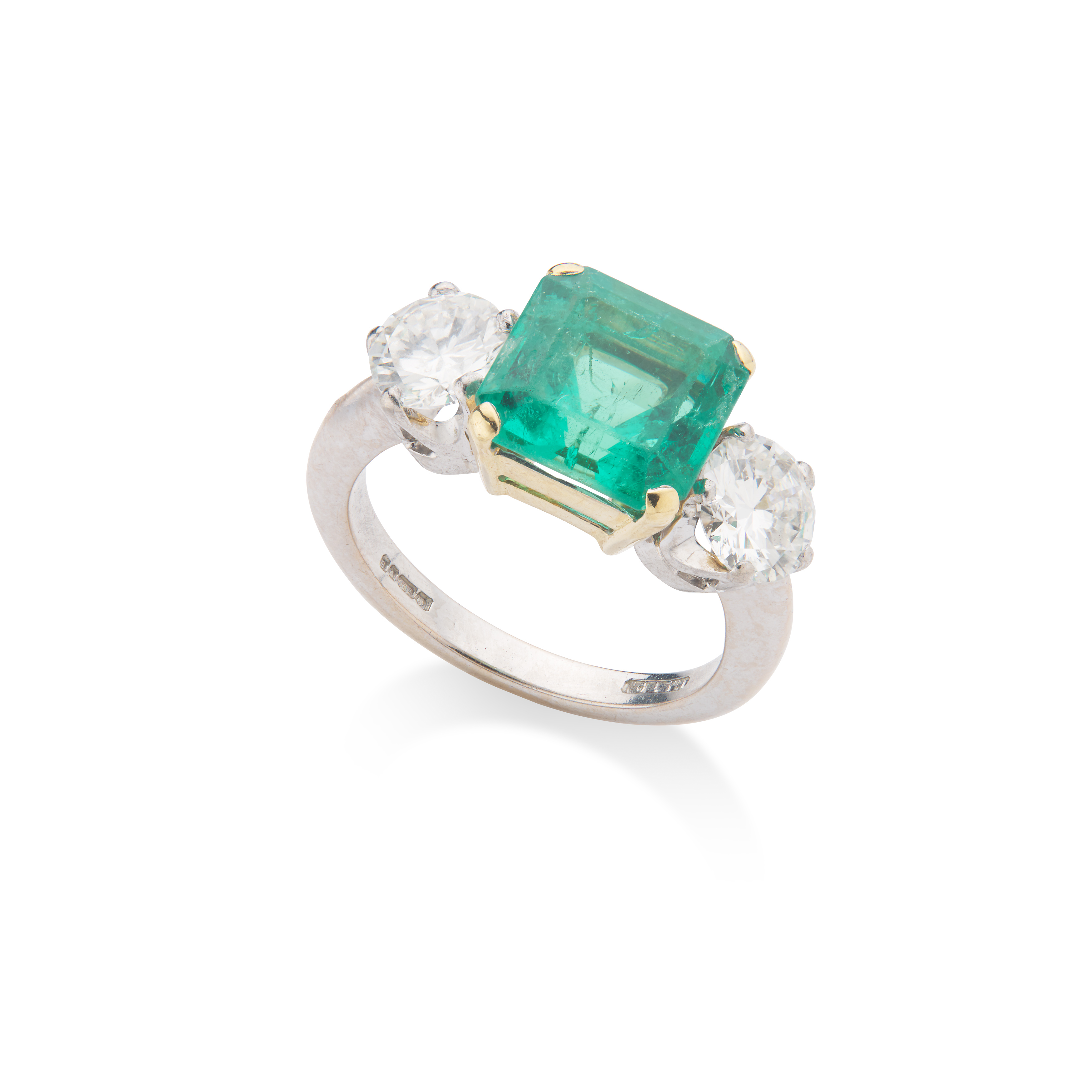 A Colombian emerald and diamond ring, 2000