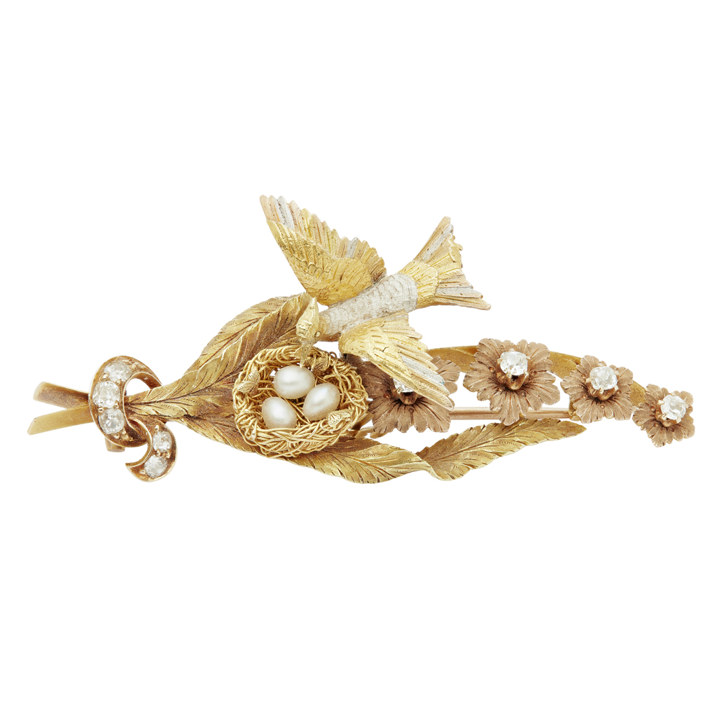 An early 20th century diamond and pearl set brooch