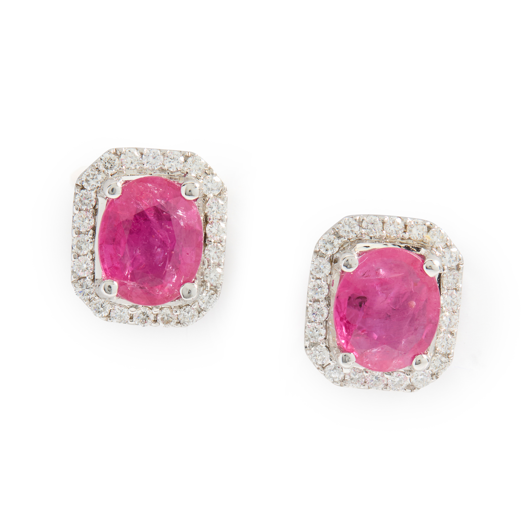 A pair of ruby and diamond cluster earrings